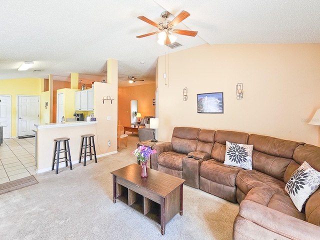 7 Bunker View Dr, Palm Coast, FL 32137 - living area featuring lofted ceiling, ceiling fan, light colored carpet, and baseboards