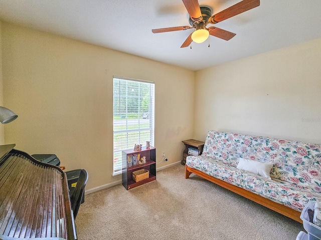 7 Bunker View Dr, Palm Coast, FL 32137 - living area featuring carpet flooring, a ceiling fan, and baseboards