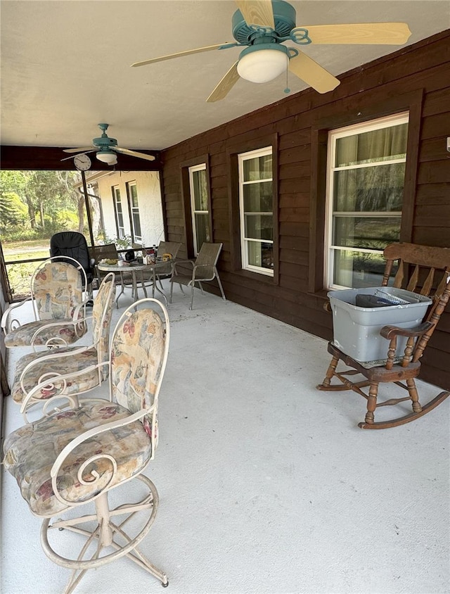 486 S US Highway 1, Oak Hill, FL 32759 - view of patio / terrace featuring a ceiling fan and outdoor dining space