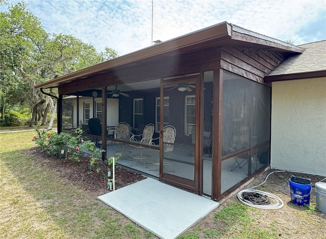 486 S US Highway 1, Oak Hill, FL 32759 - doorway to property featuring ceiling fan, stucco siding, and a patio