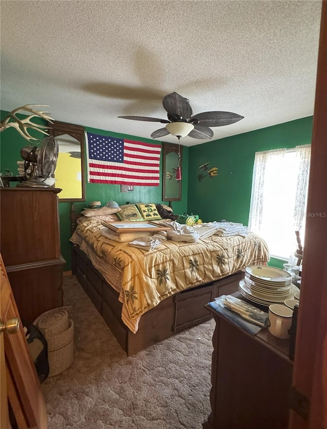 486 S US Highway 1, Oak Hill, FL 32759 - bedroom featuring a textured ceiling, multiple windows, carpet, and ceiling fan