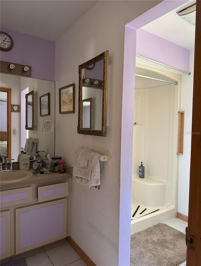 486 S US Highway 1, Oak Hill, FL 32759 - bathroom with vanity, tile patterned floors, a shower stall, and baseboards