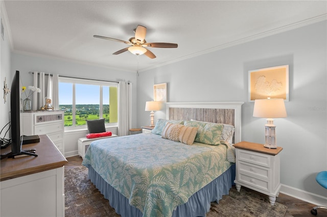 bedroom with crown molding, baseboards, ceiling fan, and dark wood-style floors