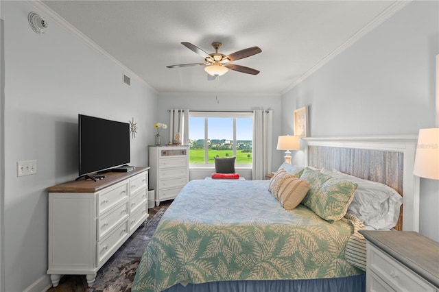 bedroom featuring ornamental molding, dark wood-style flooring, and ceiling fan