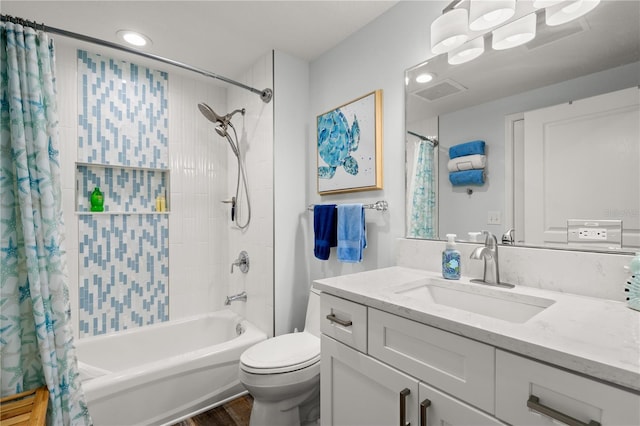 bathroom featuring shower / bath combo with shower curtain, toilet, wood finished floors, and vanity