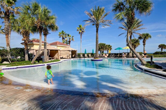 community pool featuring a gazebo
