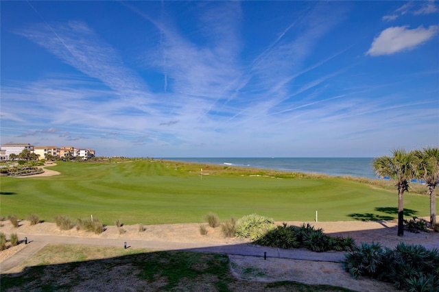 view of property's community featuring a water view and golf course view