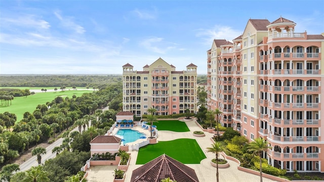 view of apartment building / complex with view of golf course