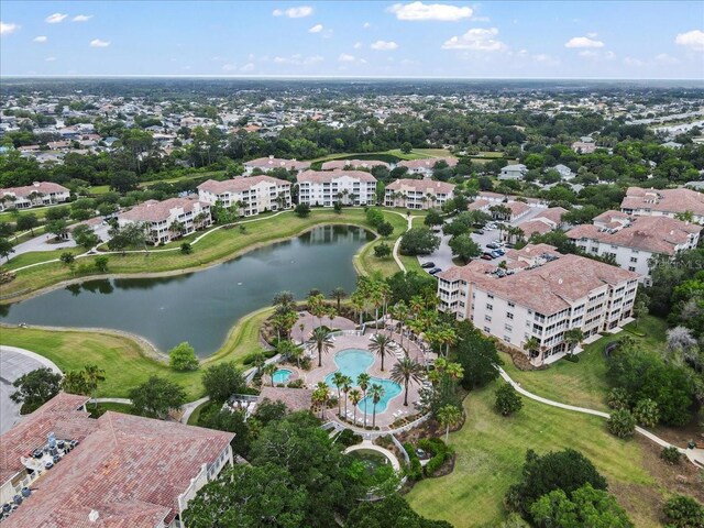 70 Riverview Bnd S Unit 715, Palm Coast, FL 32137 - aerial view of property's location featuring a large body of water, apartment complex / building, and a pool area