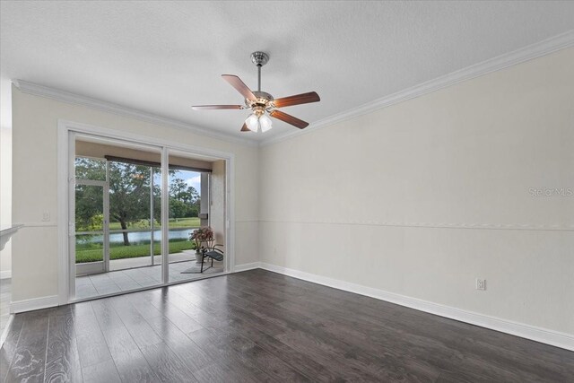 70 Riverview Bnd S Unit 715, Palm Coast, FL 32137 - spare room featuring dark wood-style floors, baseboards, a ceiling fan, and crown molding