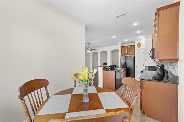 70 Riverview Bnd S Unit 715, Palm Coast, FL 32137 - dining space with a ceiling fan, recessed lighting, and ornamental molding