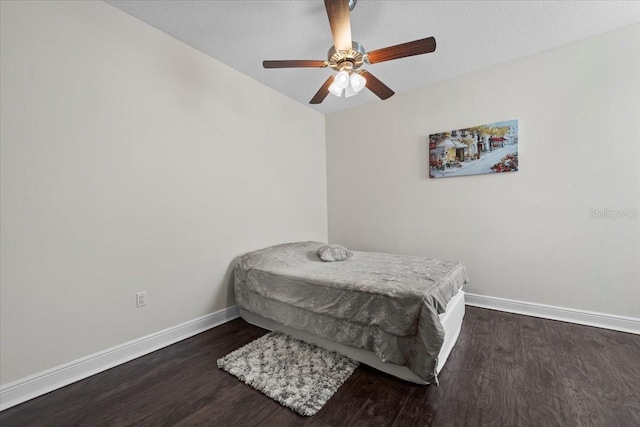70 Riverview Bnd S Unit 715, Palm Coast, FL 32137 - bedroom featuring baseboards, wood finished floors, and a ceiling fan