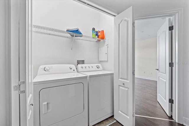 70 Riverview Bnd S Unit 715, Palm Coast, FL 32137 - laundry room with separate washer and dryer and dark wood-style flooring