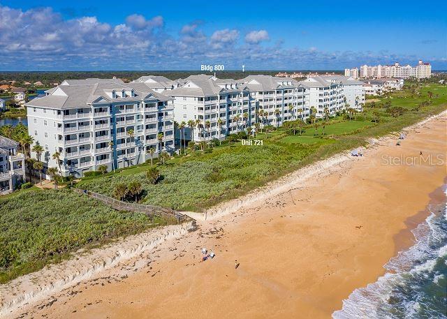 800 Cinnamon Beach Way Unit 721, Palm Coast, FL 32137 - bird's eye view of waterfront with a beach