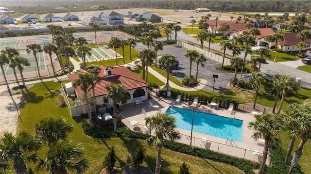 aerial view of residential area featuring a pool
