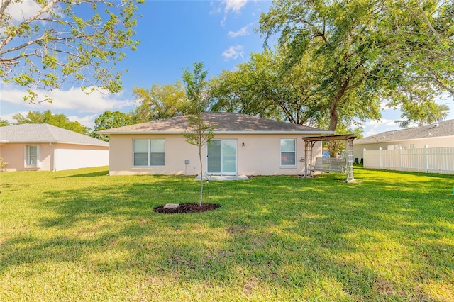 613 Clairmont Ln, South Daytona, FL 32119 - rear view of house featuring stucco siding