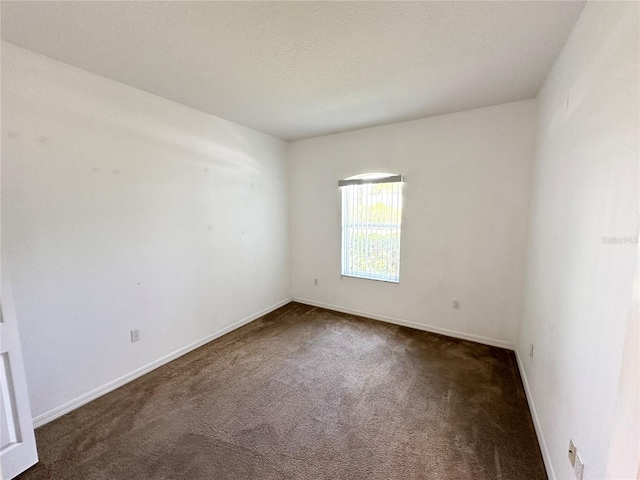 15 Ruth Dr, Palm Coast, FL 32164 - empty room with carpet flooring and baseboards