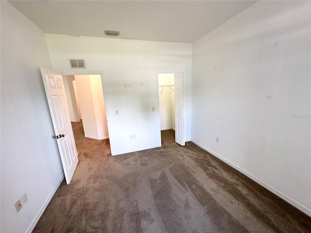 15 Ruth Dr, Palm Coast, FL 32164 - unfurnished bedroom featuring carpet, baseboards, and a closet