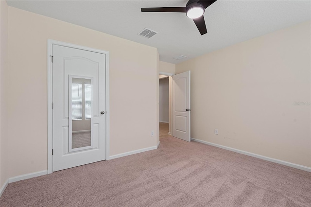 25 Red Top Ln, Palm Coast, FL 32164 - unfurnished bedroom with carpet flooring, baseboards, and ceiling fan