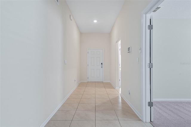 25 Red Top Ln, Palm Coast, FL 32164 - hallway featuring light tile patterned floors, baseboards, and recessed lighting