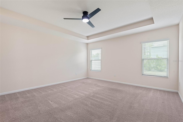 25 Red Top Ln, Palm Coast, FL 32164 - empty room featuring baseboards, carpet, and a ceiling fan