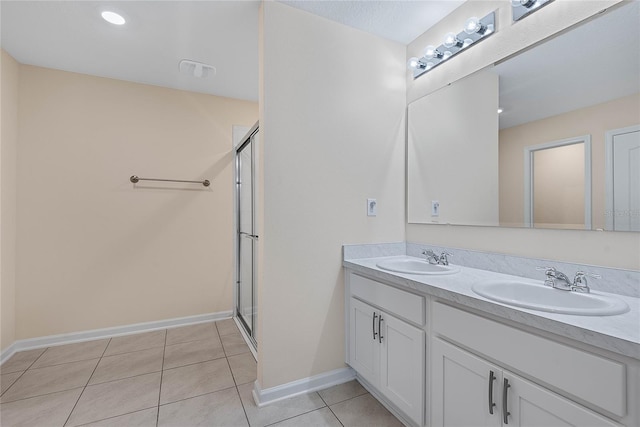25 Red Top Ln, Palm Coast, FL 32164 - full bath featuring a shower stall, tile patterned flooring, baseboards, and double vanity