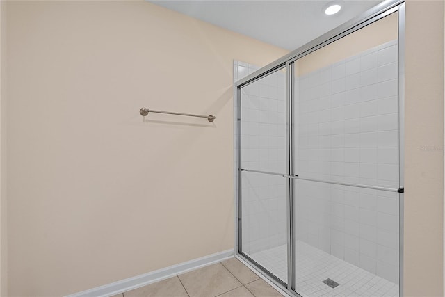 25 Red Top Ln, Palm Coast, FL 32164 - full bath with tiled shower, tile patterned floors, and baseboards
