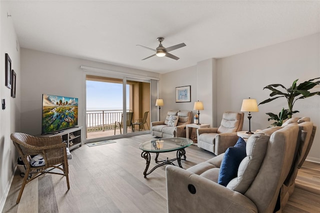80 Surfview Dr Unit 718, Palm Coast, FL 32137 - living area featuring ceiling fan and light wood finished floors