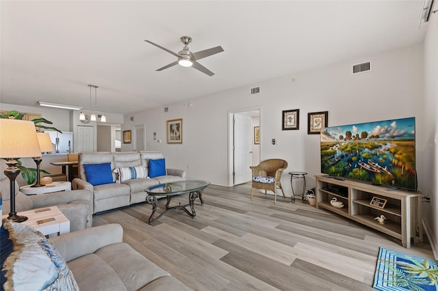 80 Surfview Dr Unit 718, Palm Coast, FL 32137 - living area featuring ceiling fan and light wood-style flooring