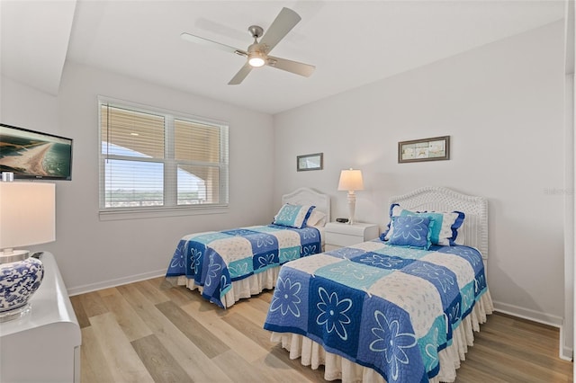 80 Surfview Dr Unit 718, Palm Coast, FL 32137 - bedroom with wood finished floors and a ceiling fan