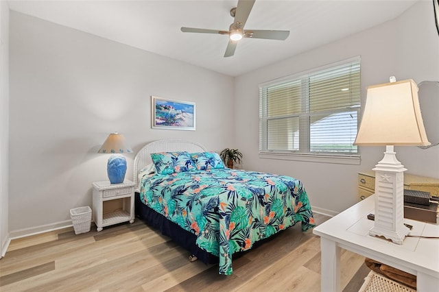 80 Surfview Dr Unit 718, Palm Coast, FL 32137 - bedroom with light wood-style flooring and ceiling fan