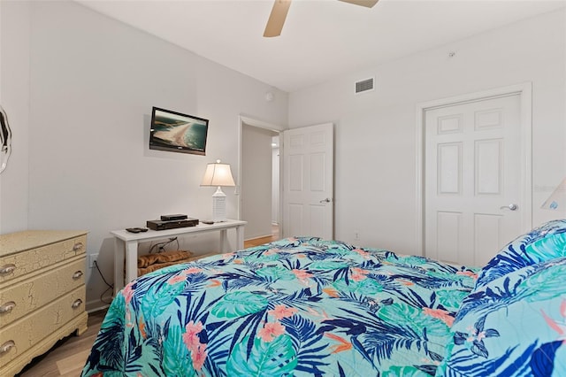 80 Surfview Dr Unit 718, Palm Coast, FL 32137 - bedroom with light wood-style flooring and a ceiling fan