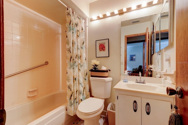 bathroom with toilet, shower / tub combo, and vanity