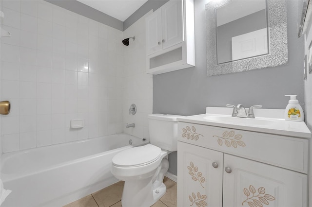 bathroom featuring tile patterned flooring, toilet, shower / tub combination, and vanity