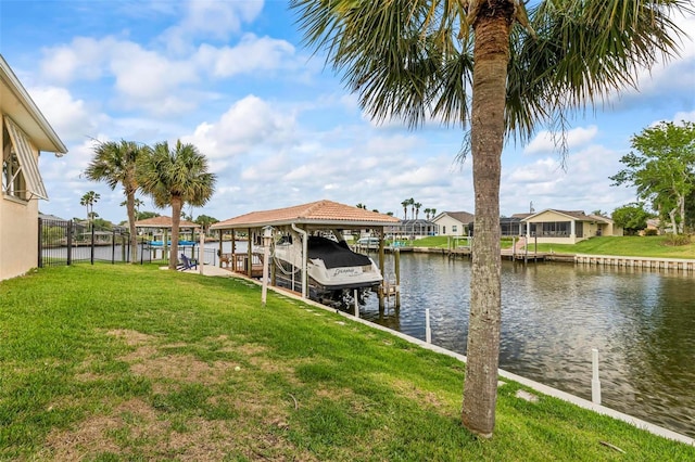 dock area with a water view and boat lift