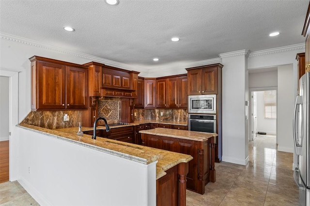 kitchen featuring stainless steel appliances, tasteful backsplash, light stone counters, a peninsula, and recessed lighting