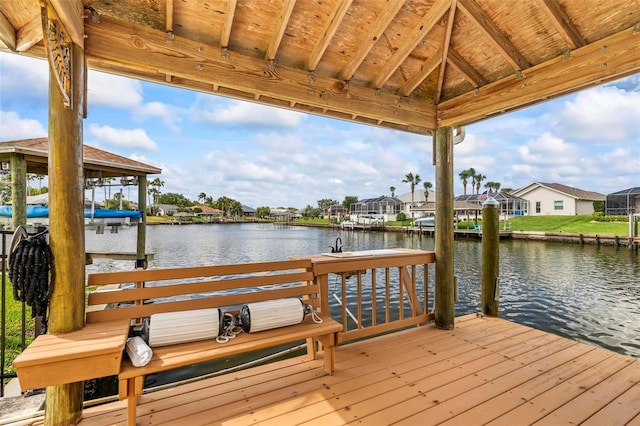 dock with a water view and a residential view