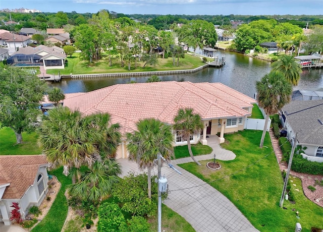 aerial perspective of suburban area with a large body of water