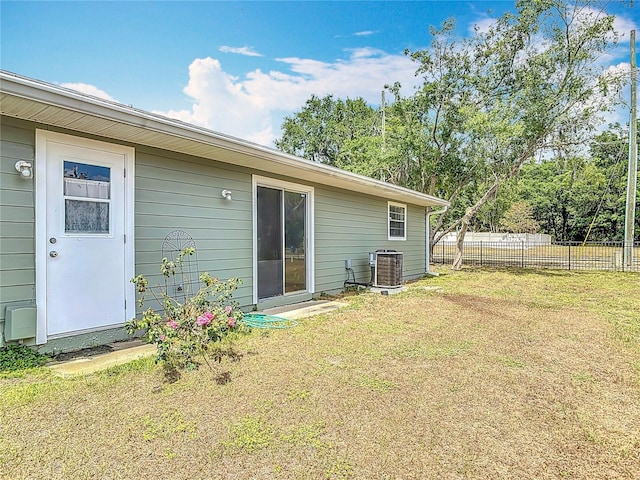 244 Oakleigh Dr Unit 200, Deland, FL 32724 - back of house featuring central AC unit