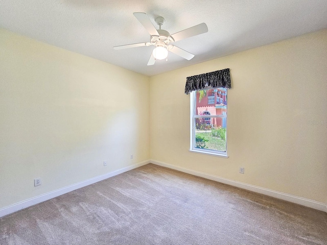 71 N Riverwalk Dr, Palm Coast, FL 32137 - unfurnished room featuring baseboards, carpet flooring, and a ceiling fan