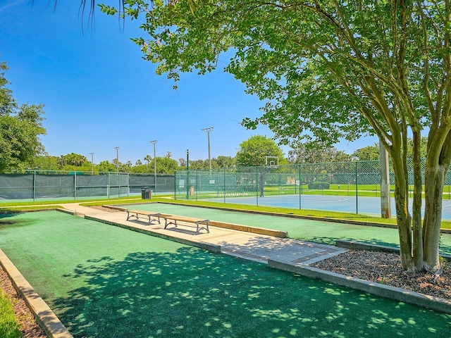 71 N Riverwalk Dr, Palm Coast, FL 32137 - view of home's community featuring a game area and fence