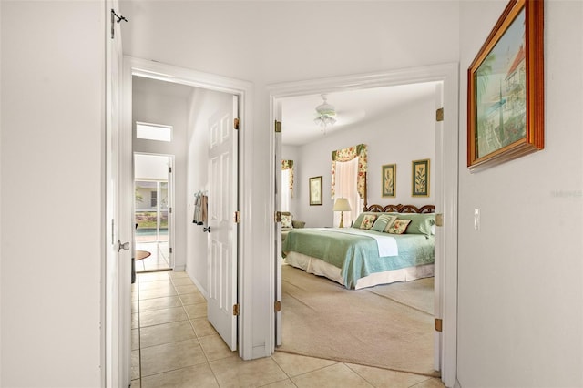 91 Breeze Hill Ln, Palm Coast, FL 32137 - bedroom featuring light tile patterned floors and light colored carpet
