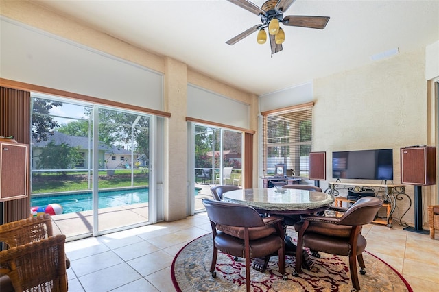 91 Breeze Hill Ln, Palm Coast, FL 32137 - dining room with light tile patterned flooring and a ceiling fan