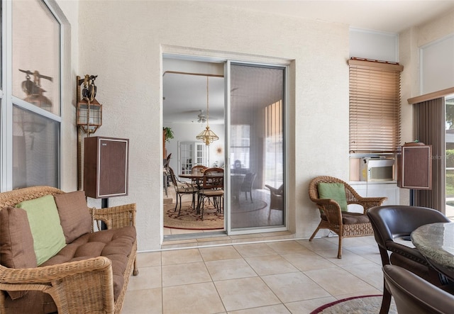 91 Breeze Hill Ln, Palm Coast, FL 32137 - sitting room featuring tile patterned flooring and a textured wall