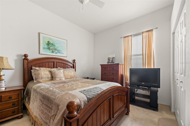 91 Breeze Hill Ln, Palm Coast, FL 32137 - bedroom with light carpet, a closet, baseboards, and a ceiling fan