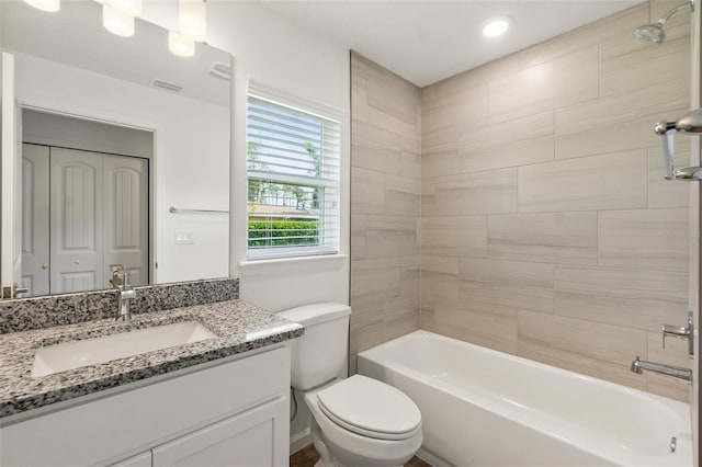 19 Ethel Ln, Palm Coast, FL 32164 - full bath with toilet, vanity, shower / bathtub combination, and recessed lighting