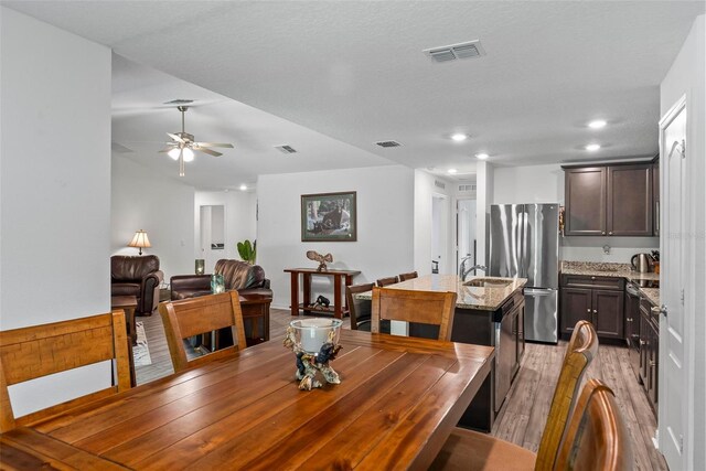 9 Waldron Pl, Palm Coast, FL 32164 - dining space featuring light wood-style flooring, ceiling fan, and recessed lighting