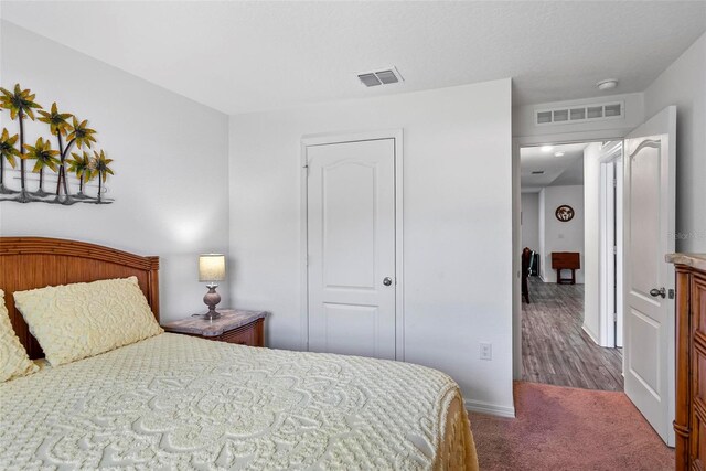 9 Waldron Pl, Palm Coast, FL 32164 - bedroom with carpet floors and baseboards