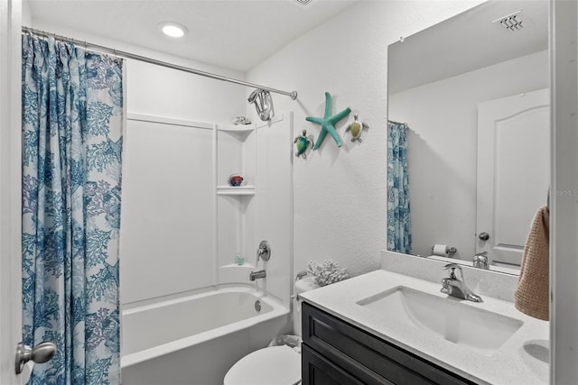 9 Waldron Pl, Palm Coast, FL 32164 - bathroom with a textured wall, shower / bath combo with shower curtain, vanity, and toilet