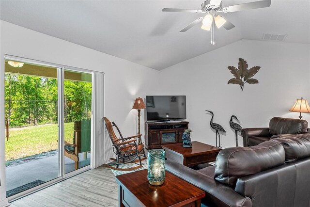 9 Waldron Pl, Palm Coast, FL 32164 - living area featuring vaulted ceiling, light wood-type flooring, and ceiling fan